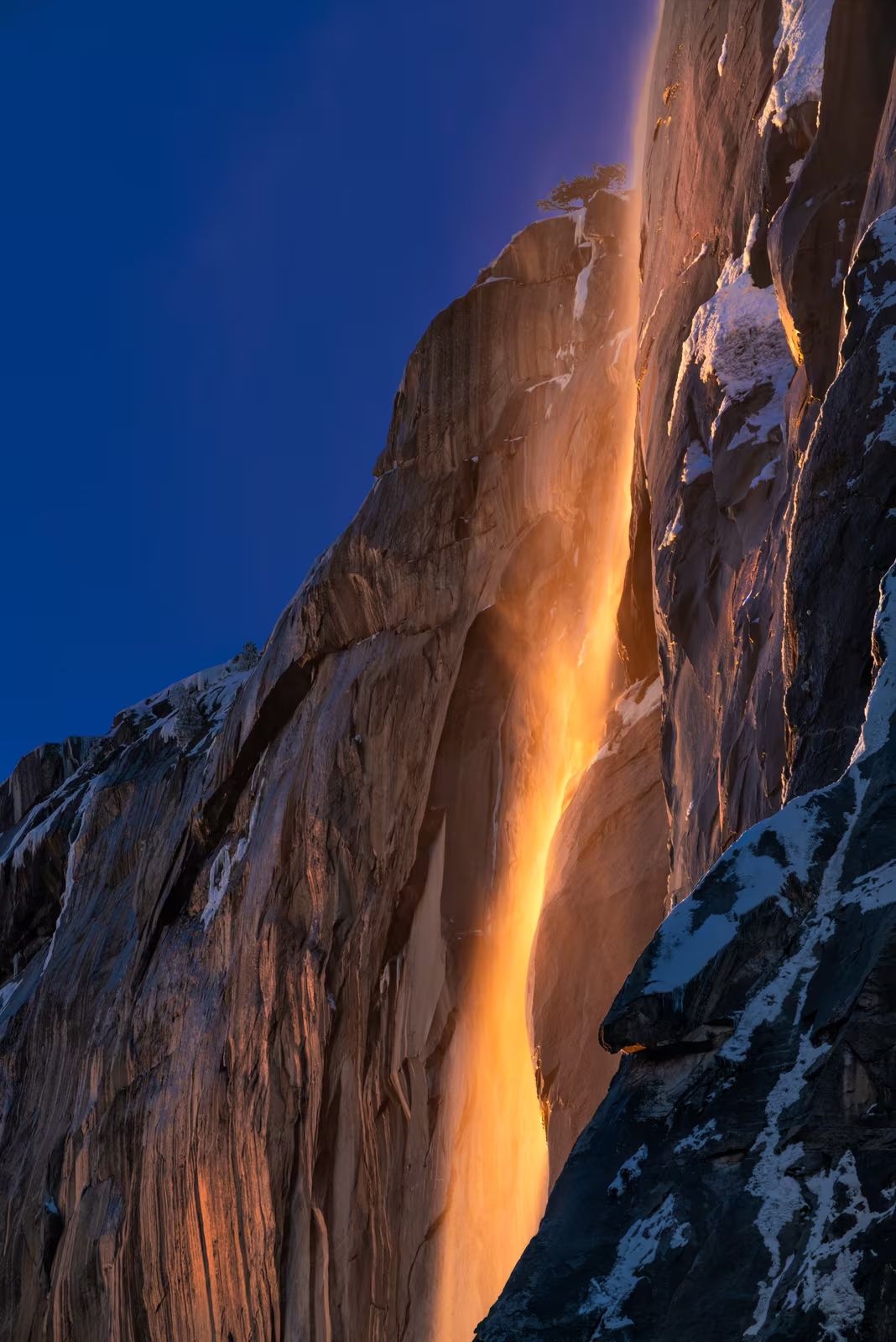 Fire Fall — Horsetail Falls lighting up like fire in a seasonal, spectacular winter glow. I spent a handful of years trying to witness the fire fall event in Yosemite. Usually spoiled by cloud cover or lack of water, I finally got lucky enough to experience the conditions lining up during one of my winter visits. | Yosemite National Park - 2018